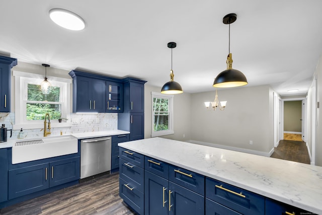 216 Old Monson Rd, Stafford, CT 06076 - kitchen with dishwasher, blue cabinetry, backsplash, and dark wood-style flooring