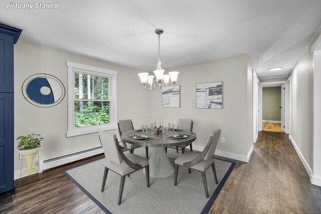 216 Old Monson Rd, Stafford, CT 06076 - dining room with a baseboard radiator, a chandelier, and dark wood finished floors