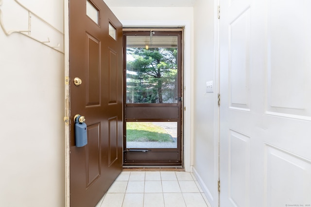 489 Wolcott St Unit 65, Bristol, CT 06010 - entryway featuring light tile patterned flooring and baseboards