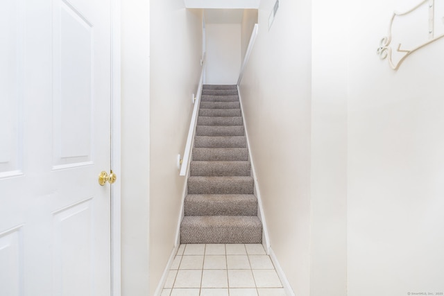 489 Wolcott St Unit 65, Bristol, CT 06010 - staircase with baseboards and tile patterned flooring
