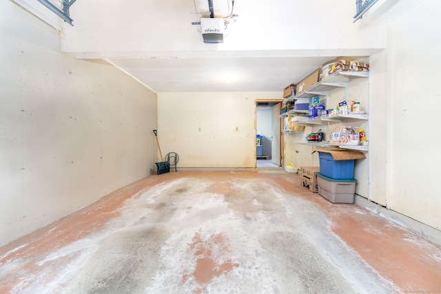 489 Wolcott St Unit 65, Bristol, CT 06010 - garage featuring a garage door opener