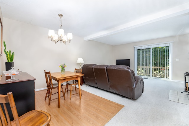 489 Wolcott St Unit 65, Bristol, CT 06010 - dining area featuring a chandelier and beam ceiling