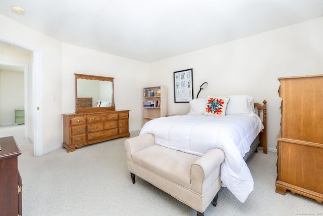 489 Wolcott St Unit 65, Bristol, CT 06010 - bedroom featuring light carpet and baseboards