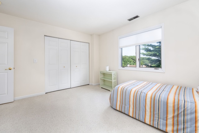 489 Wolcott St Unit 65, Bristol, CT 06010 - bedroom with baseboards and a closet