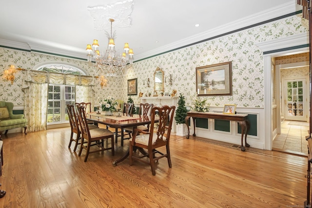 63 Turney Rd, Redding, CT 06896 - dining room with wallpapered walls, a chandelier, light wood finished floors, and ornamental molding