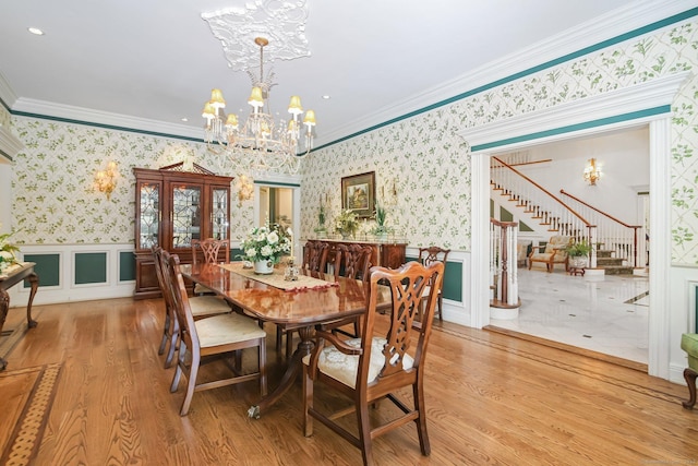 63 Turney Rd, Redding, CT 06896 - dining area featuring wallpapered walls, a chandelier, stairs, a wainscoted wall, and wood finished floors