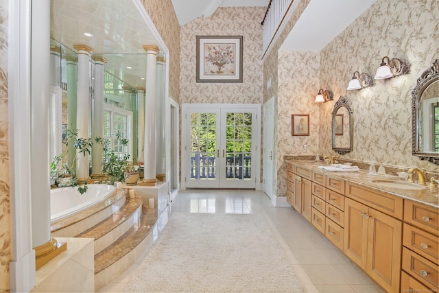 63 Turney Rd, Redding, CT 06896 - full bath with wallpapered walls, a shower stall, a bath, double vanity, and french doors