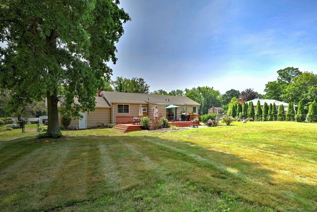 754 Riverside Dr, Orange, CT 06477 - back of property with a deck