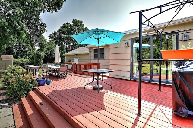 754 Riverside Dr, Orange, CT 06477 - wooden deck featuring outdoor dining area