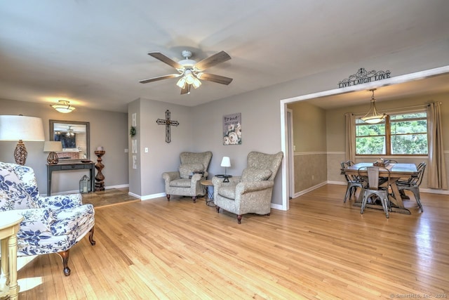 754 Riverside Dr, Orange, CT 06477 - living area with ceiling fan and light wood finished floors