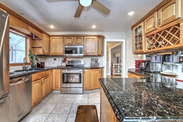 754 Riverside Dr, Orange, CT 06477 - kitchen featuring appliances with stainless steel finishes, a ceiling fan, backsplash, light tile patterned floors, and open shelves