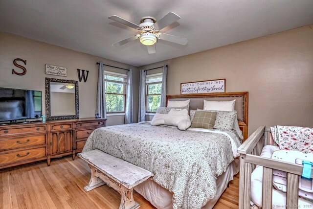 754 Riverside Dr, Orange, CT 06477 - bedroom featuring light wood-type flooring and ceiling fan