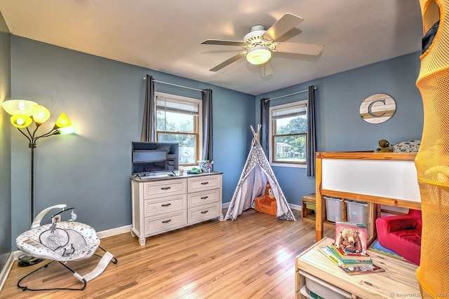 754 Riverside Dr, Orange, CT 06477 - rec room with light wood-style flooring, plenty of natural light, and ceiling fan