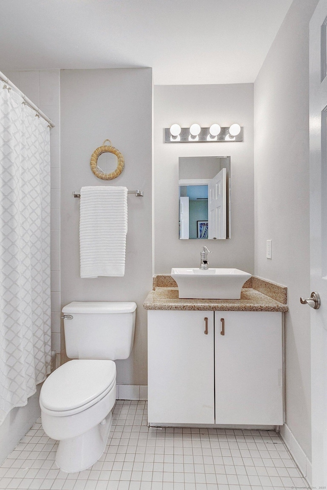 118 Grove St Apt 7, Stamford, CT 06901 - full bathroom with vanity, tile patterned flooring, and curtained shower