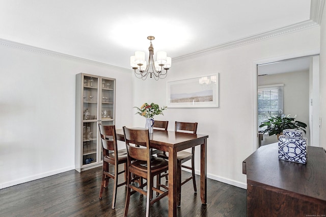 118 Grove St Apt 7, Stamford, CT 06901 - dining space featuring a chandelier, ornamental molding, and dark wood-type flooring