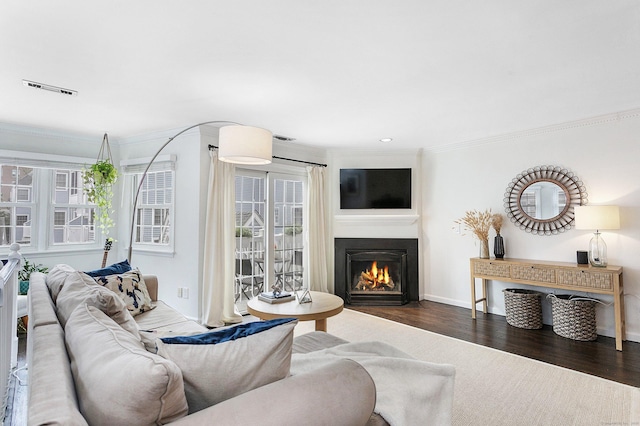 118 Grove St Apt 7, Stamford, CT 06901 - living room with ornamental molding, wood finished floors, plenty of natural light, a fireplace, and recessed lighting