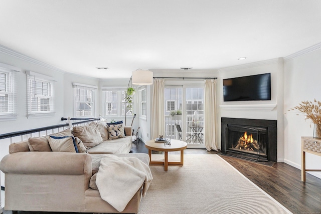 118 Grove St Apt 7, Stamford, CT 06901 - living area featuring crown molding, wood finished floors, a fireplace with flush hearth, and recessed lighting