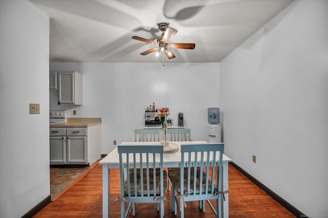34 Woodland Dr Unit 34, Cromwell, CT 06416 - dining area featuring a ceiling fan and dark wood-type flooring