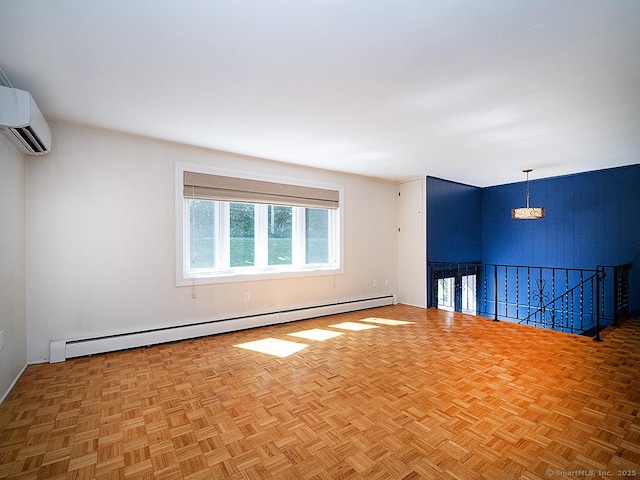 481 Gaylord Mountain Rd, Hamden, CT 06518 - empty room featuring a baseboard heating unit, a wall mounted AC, and a chandelier