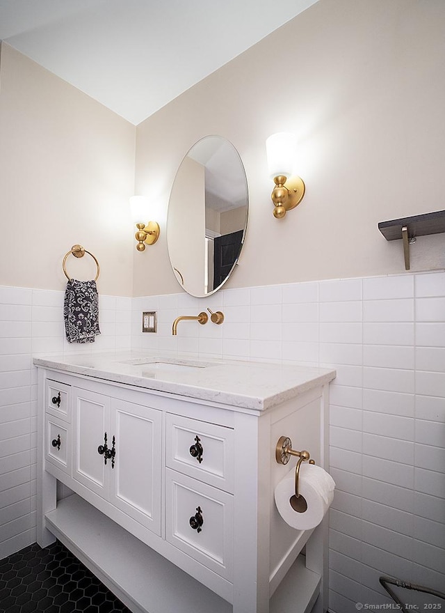 481 Gaylord Mountain Rd, Hamden, CT 06518 - bathroom featuring tile walls, a wainscoted wall, vanity, and tile patterned flooring