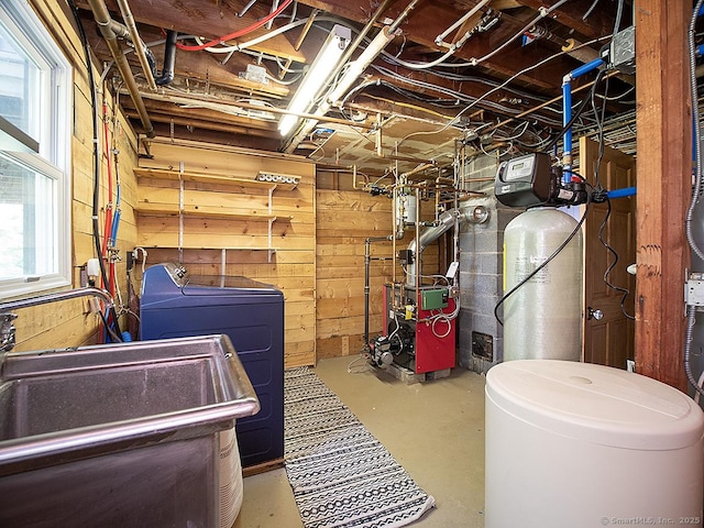 481 Gaylord Mountain Rd, Hamden, CT 06518 - basement featuring a heating unit, a water softener system, washer and dryer, and wood walls