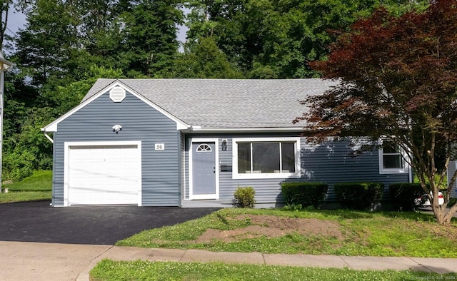 56 George St, Bristol, CT 06010 - view of front of home with a garage, a shingled roof, and asphalt driveway