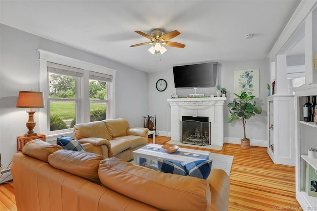 146 Summit St, Manchester, CT 06040 - living area featuring a fireplace, wood finished floors, and a ceiling fan