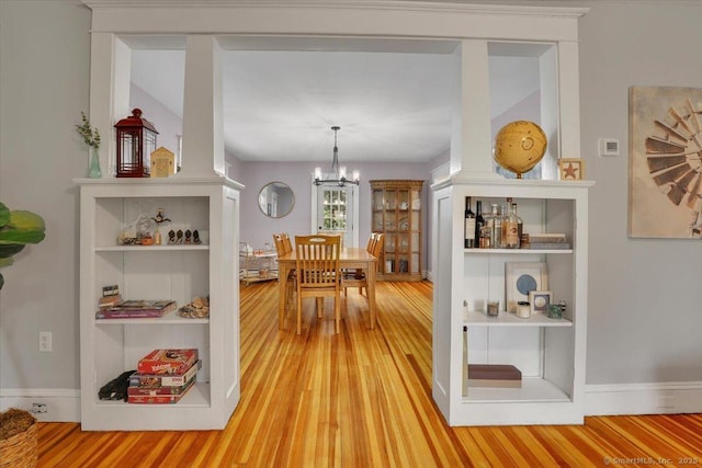 146 Summit St, Manchester, CT 06040 - dining space with wood finished floors and a chandelier