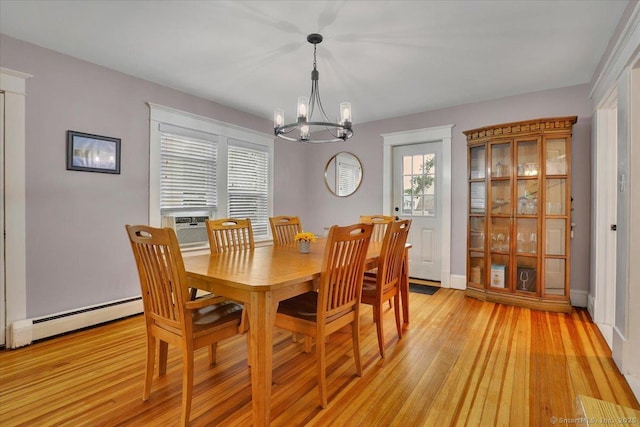 146 Summit St, Manchester, CT 06040 - dining room with a baseboard heating unit, a chandelier, light wood-type flooring, and cooling unit