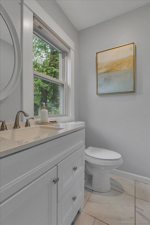 146 Summit St, Manchester, CT 06040 - bathroom featuring vanity and marble look tiles