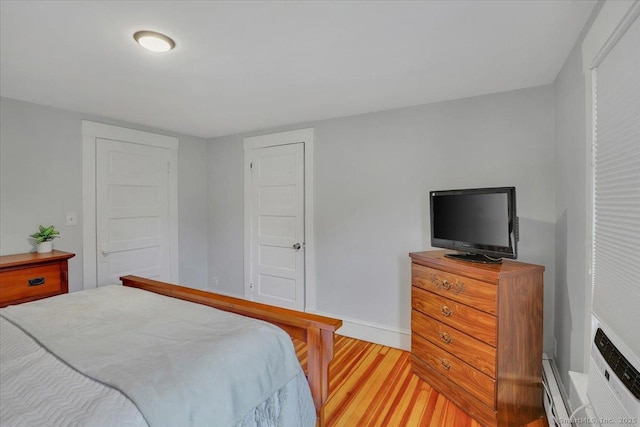 146 Summit St, Manchester, CT 06040 - bedroom with light wood-type flooring and baseboard heating