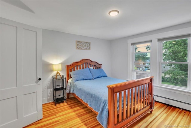 146 Summit St, Manchester, CT 06040 - bedroom featuring light wood finished floors and a baseboard radiator