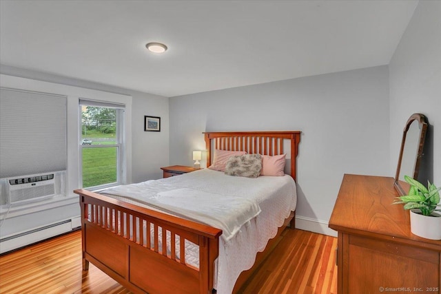 146 Summit St, Manchester, CT 06040 - bedroom with a baseboard radiator, wood finished floors, and cooling unit