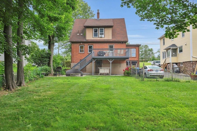 146 Summit St, Manchester, CT 06040 - rear view of house with stairway, a wooden deck, brick siding, and a chimney