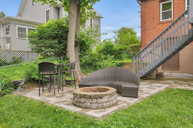 146 Summit St, Manchester, CT 06040 - view of grassy yard with an outdoor fire pit and a patio