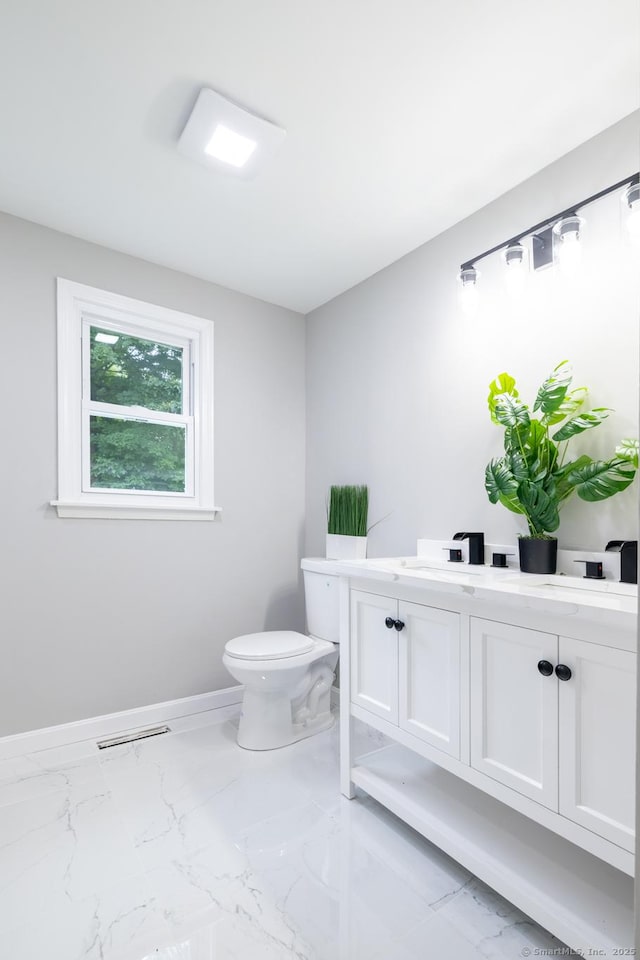 107 Meetinghouse Rdg, Meriden, CT 06450 - bathroom featuring vanity and marble look tiles