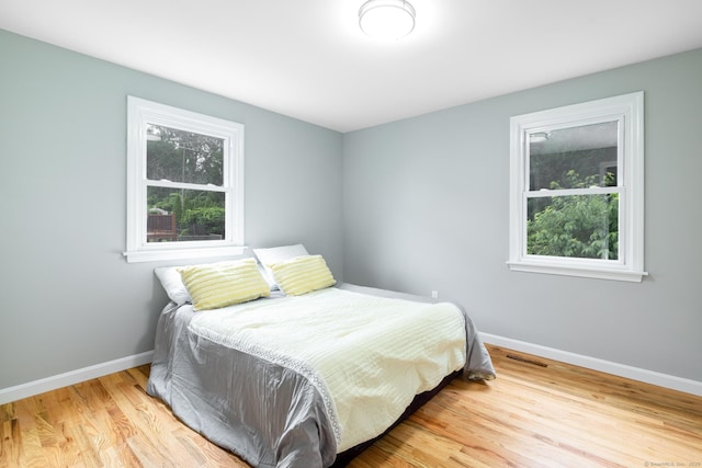 107 Meetinghouse Rdg, Meriden, CT 06450 - bedroom with baseboards and wood finished floors