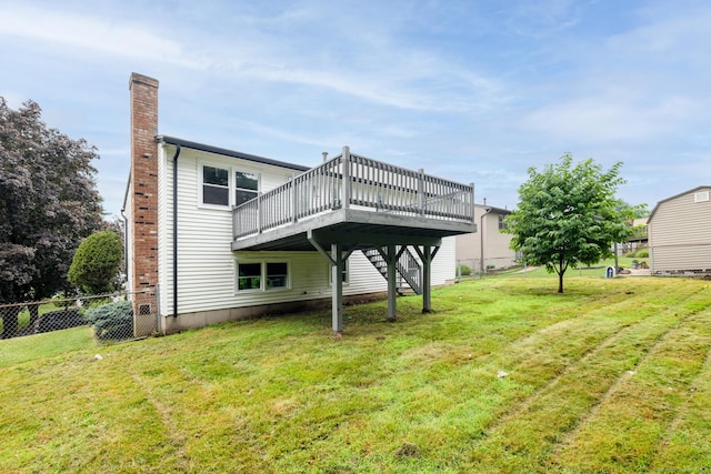 107 Meetinghouse Rdg, Meriden, CT 06450 - back of property with a chimney, a deck, and stairway