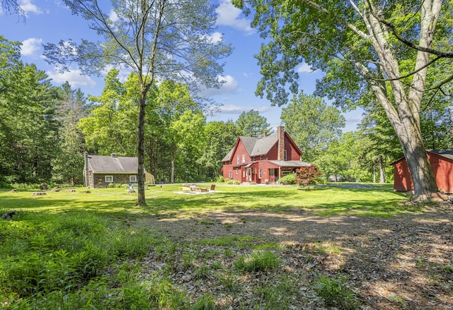 285 E St, Stafford, CT 06076 - view of green lawn with an outbuilding