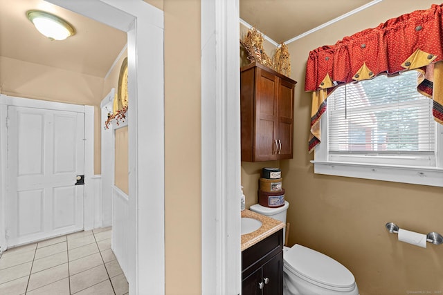 285 E St, Stafford, CT 06076 - bathroom with vanity, tile patterned floors, wainscoting, and crown molding