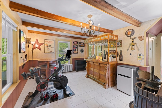 285 E St, Stafford, CT 06076 - exercise area featuring wallpapered walls, light tile patterned floors, a chandelier, and radiator heating unit
