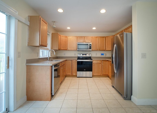 128 Briar Ln Unit 128, Norwich, CT 06360 - kitchen featuring appliances with stainless steel finishes, recessed lighting, light countertops, light tile patterned floors, and light brown cabinets