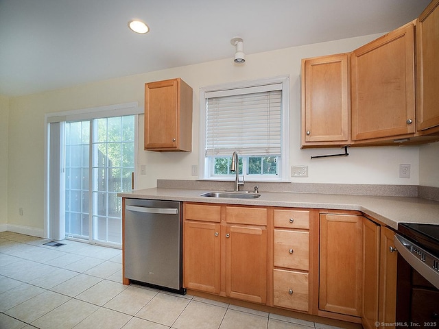 128 Briar Ln Unit 128, Norwich, CT 06360 - kitchen with dishwasher, light tile patterned flooring, light countertops, and recessed lighting