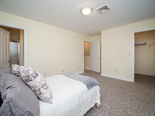 128 Briar Ln Unit 128, Norwich, CT 06360 - carpeted bedroom featuring a walk in closet and a closet