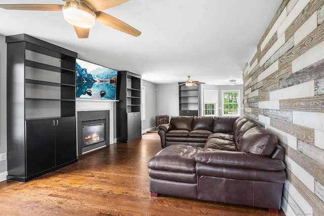 5 Evas Ter, Wolcott, CT 06716 - living area with a glass covered fireplace, a ceiling fan, and wood finished floors
