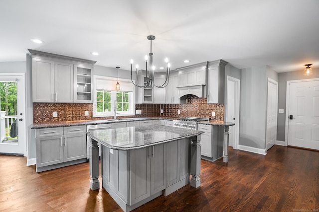5 Evas Ter, Wolcott, CT 06716 - kitchen with gray cabinetry, plenty of natural light, glass insert cabinets, dark stone counters, and recessed lighting