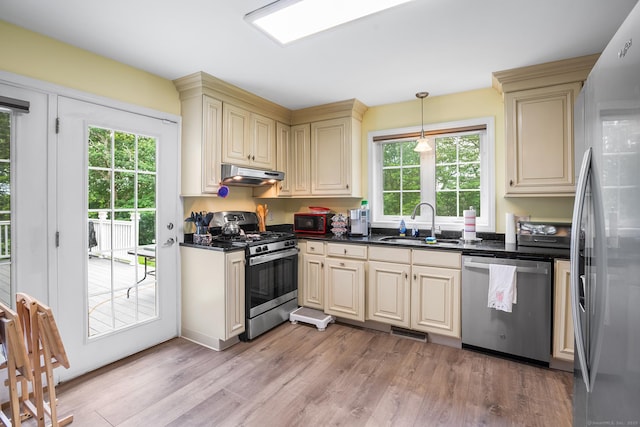 5 Evas Ter, Wolcott, CT 06716 - kitchen featuring stainless steel appliances, cream cabinetry, and dark countertops