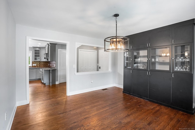 5 Evas Ter, Wolcott, CT 06716 - unfurnished dining area featuring a chandelier and dark wood finished floors
