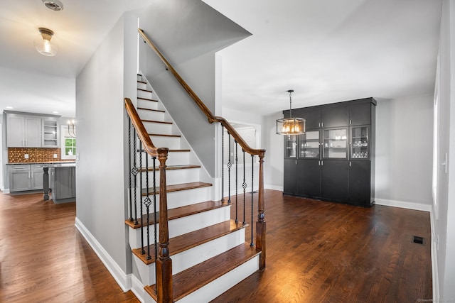 5 Evas Ter, Wolcott, CT 06716 - stairs with wood finished floors and a chandelier
