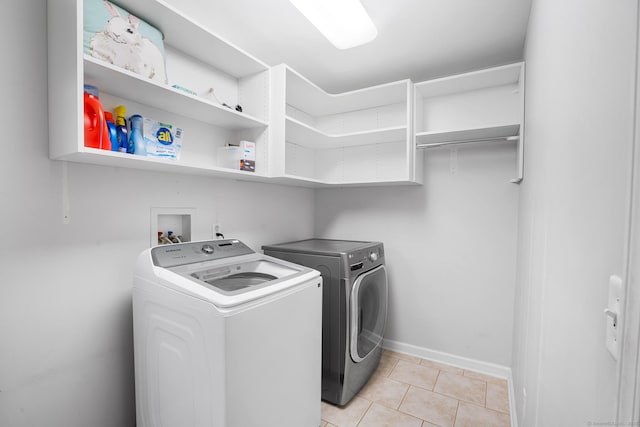 5 Evas Ter, Wolcott, CT 06716 - washroom with washing machine and dryer and light tile patterned floors